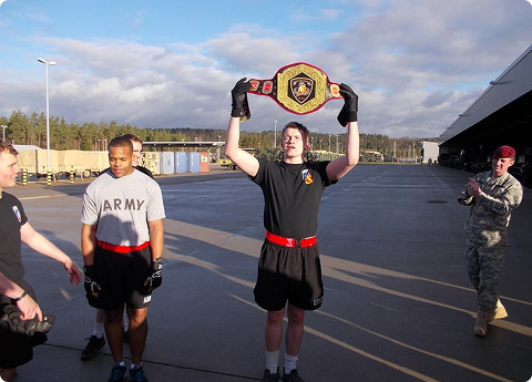 Military champion with title belt