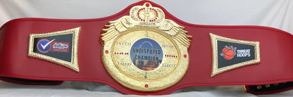 A red and gold championship belt 