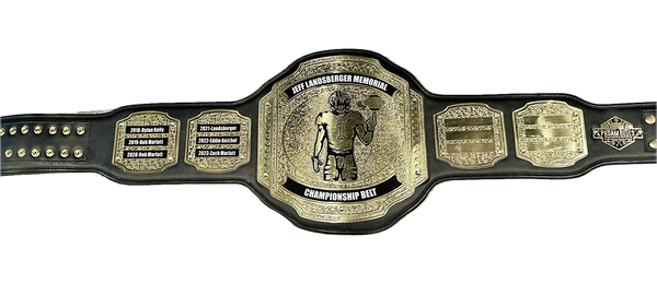 Black and gold championship belt with detailed design